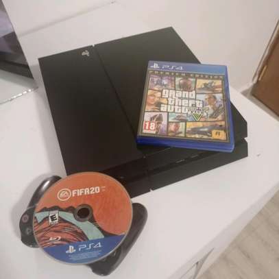 PS4 for sale with two free games image 1