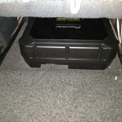 Nissan Tiida space saving Bass underseat subwoofer image 1