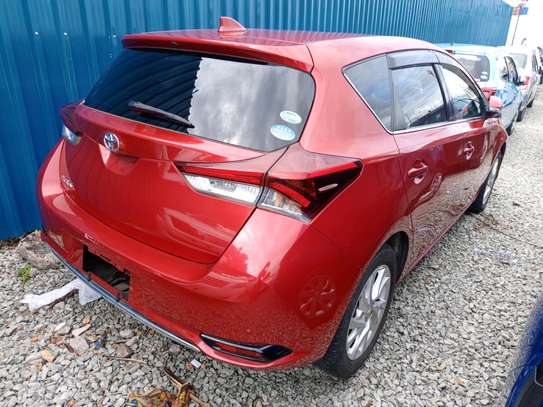 Toyota Auris redwine Car image 5