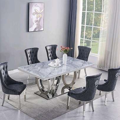 Marble dining table with mirrored base with 6 chairs image 1