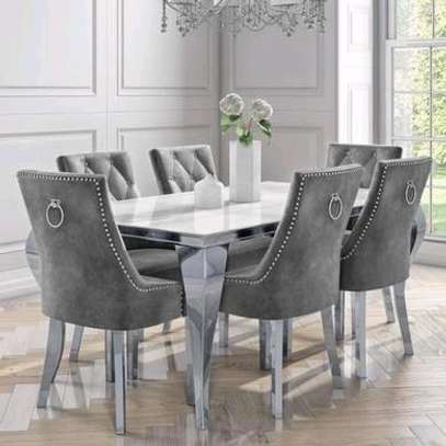 White mirrored glass table with 6 chairs image 1