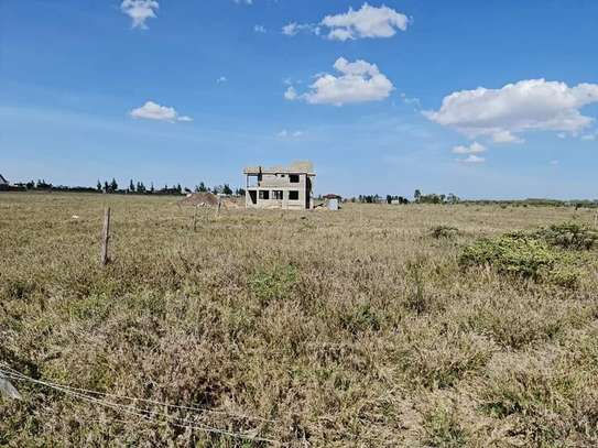 AFFORDABLE 50 BY 100 LAND ON SALE IN KITENGELA image 1