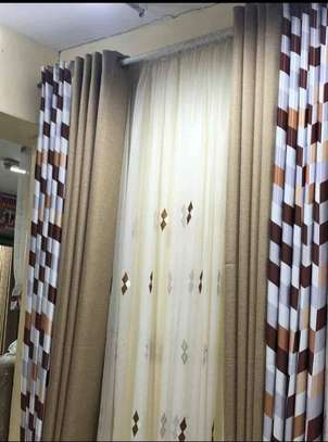 MARCHING CURTAINS FOR BROWN SOFA image 1