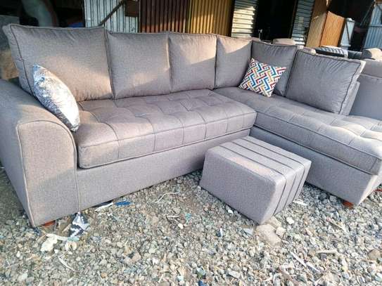 L shaped sofa with footrest image 1