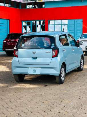 Make Daihatsu Mira 2019 model blue color automatic. image 3