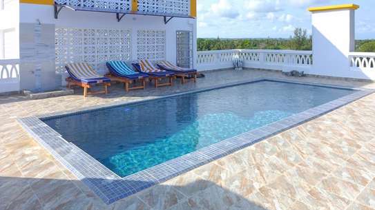 2 Bed Apartment with Swimming Pool at Diani Complex image 4