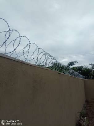 wall top electric fencing installation in kenya image 11