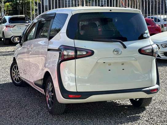 Toyota Sienta perl white color fully loaded 2019 model. image 2