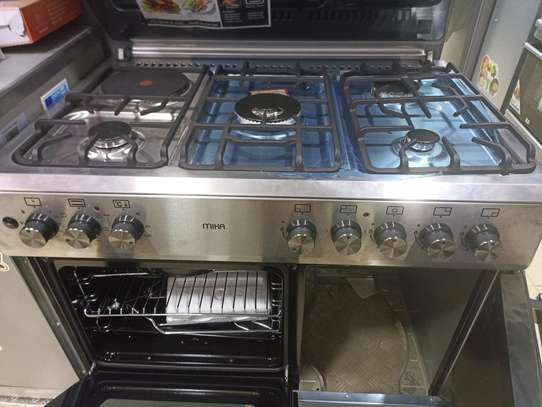 Mika 60 by 90 1 electric 4gas cooker on offer image 1