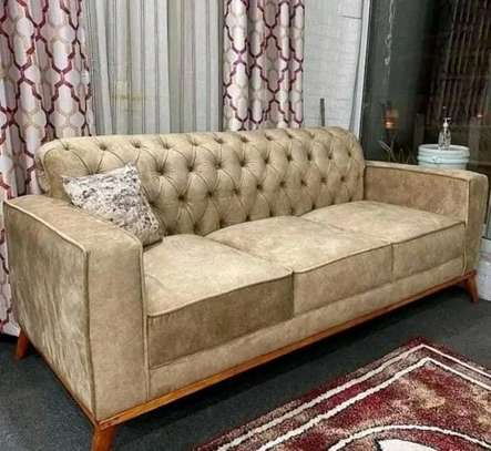 Tufted sofa image 1