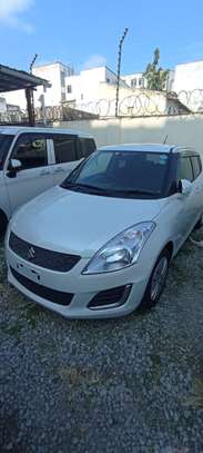 Suzuki swift white 2017 image 1