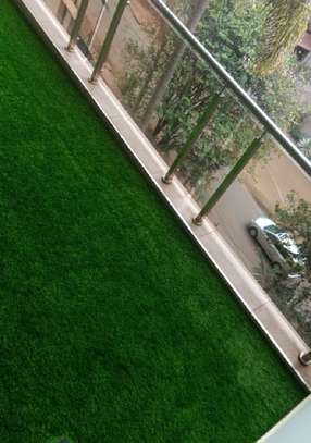 get your balcony looking classy in artificial grass carpet image 2