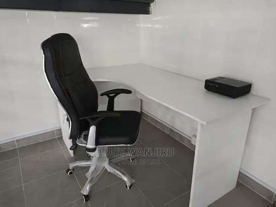 Leather office chair and a desk image 1
