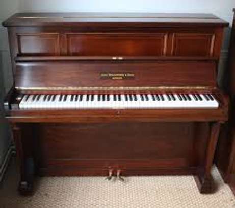 Piano servicing, tuning, repair, restoration,moving & sales. image 11