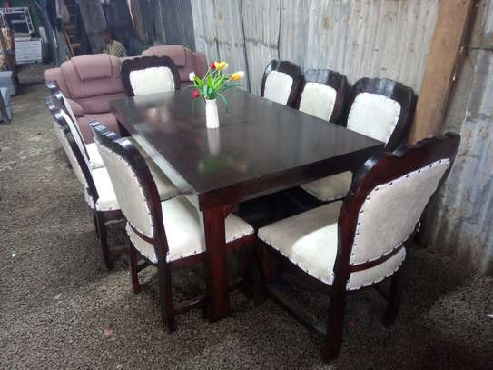 6 seater dining table made by hand wood maonganyi image 4