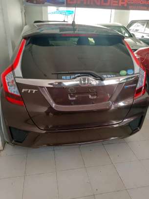 Honda fit hybrid maroon image 3