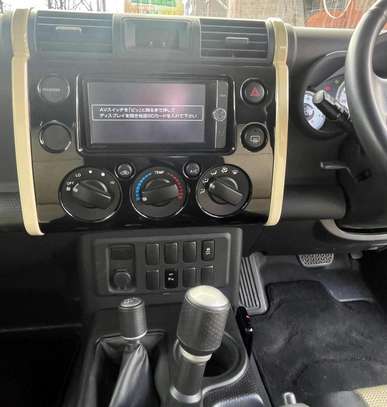 Make Toyota FJ Cruiser Beige color 2018 model. image 9