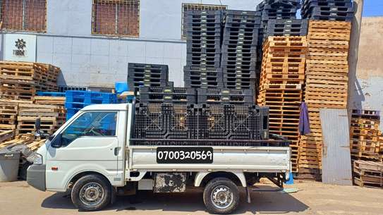 Used black  plastic pallets image 2