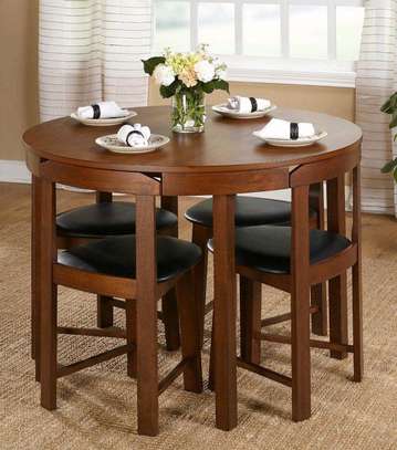 Dinning table design with 4, chairs image 1