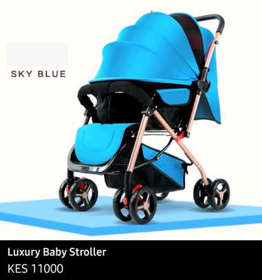 Foldable stroller with reversible handle image 1