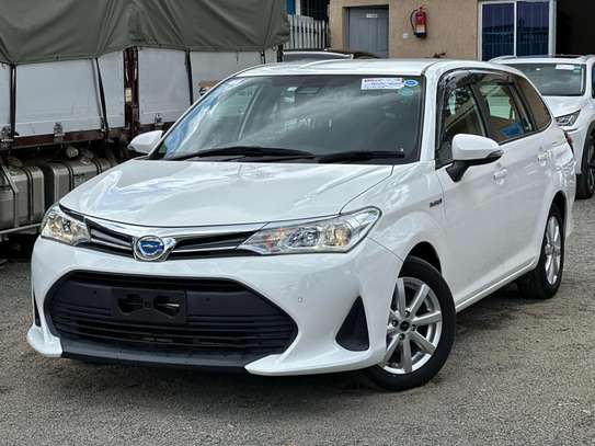 Toyota Fielder hybrid Pearl white color 2018 model . image 3