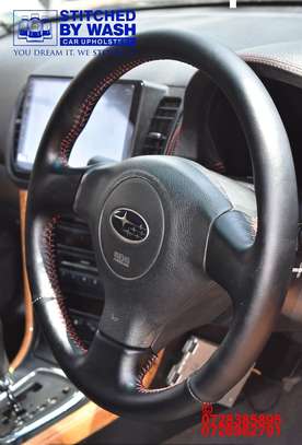 Subaru outback dashboard, steering and handbrake stitching image 4