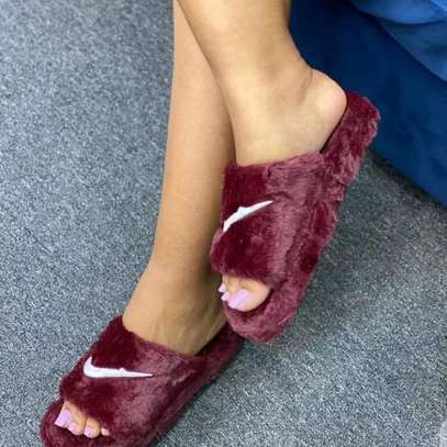 Nike fluffy sandals sales