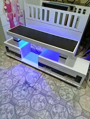 Non motorized tv stand with light image 1