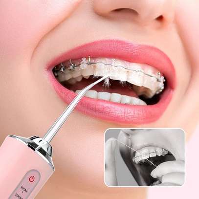 Dental Water Jet Irrigator Teeth Cleaner image 1