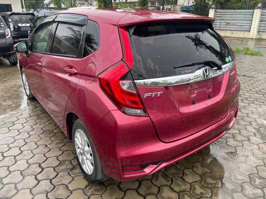 Honda fit hybrid maroon image 1