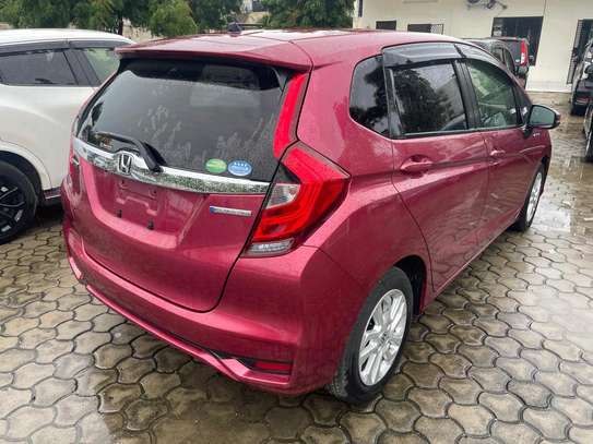 Honda fit hybrid maroon image 10