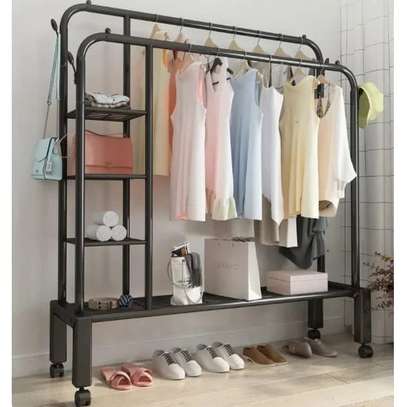 Double pole cloth rack with lower and side storage image 1
