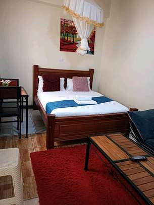 Airbnb studio in Ngara with rooftop pool and cityview image 2