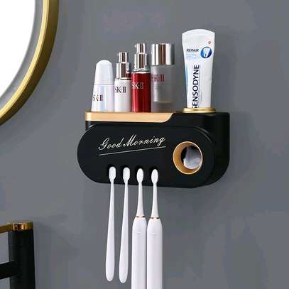 Classy Toothpaste dispenser and toothbrush holder* image 1