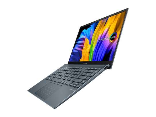 ASUS ZenBook 13 Ultra-Slim Laptop, 13.3" OLED FHD NanoEdge Bezel Display, AMD Ryzen 7 5700U, 8GB LPDDR4X RAM, 512GB PCIe SSD, NumberPad, Wi-Fi 5, Windows 10 Home, Pine Grey, UM325UA-DS71 image 2