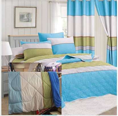 BEAUTIFUL MATCHING CURTAINS AND DUVETS image 4