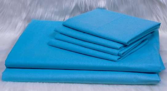 blue colored cotton bed sheets image 1