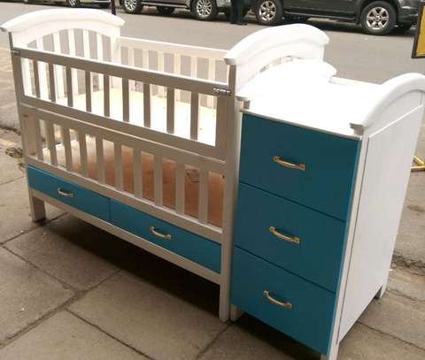 baby cot and chest of drawers
