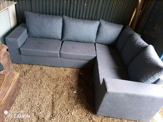 L-shaped sofa with two arms image 1