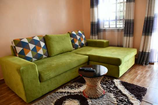 Ex DINKU 5 seater L sofa image 1