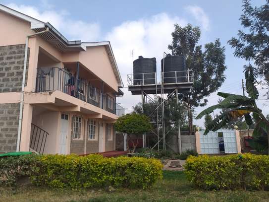 A block of apartments for sale - Mwihoko. image 1