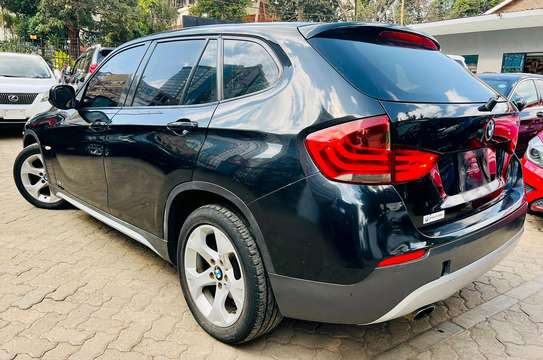 BMW X1 Year 2012 black colour very clean image 3