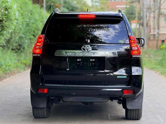 Make Toyota Land cruiser Prado TX black color fully loaded. image 3