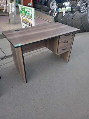Writing desk with pullout drawers image 1