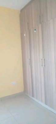 Compact Shower Cabin with Tiled Walls & Faucet image 2