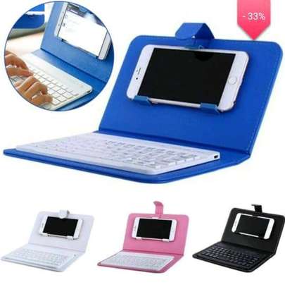 Multifunctional Bluetooth keyboard leather pouch cover image 1