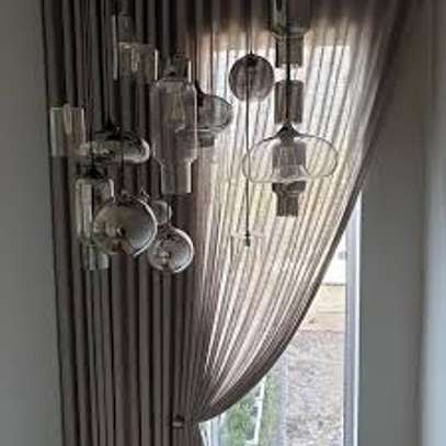 Fitting curtains, rails, tracks, and poles on your windows image 9