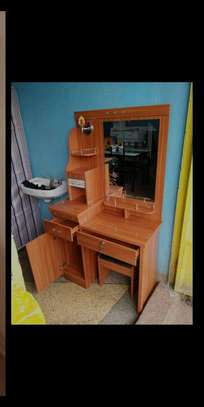 Wooden dressing table with a soft cushioned stool image 1
