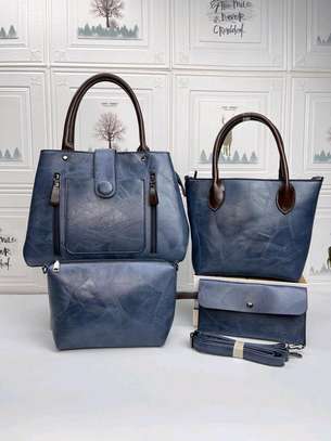 Navy blue designer handbags image 1