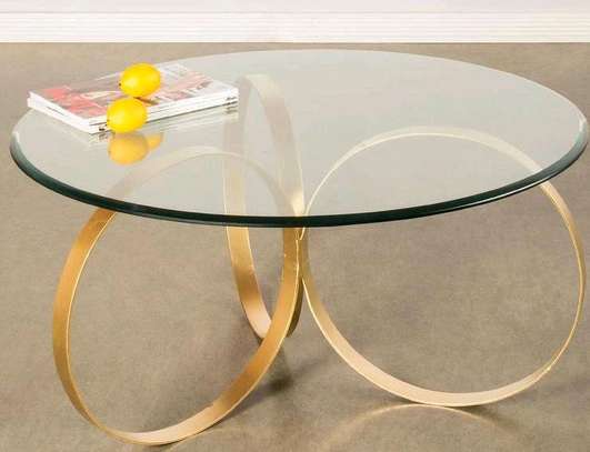 Glass coffee table golden base image 1